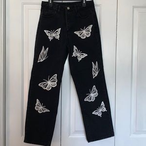 Black butterfly jeans